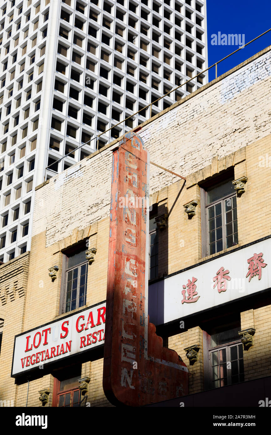 Old neon sign for Lotus garden restaurant with 600 California st skyscraper behind. Chinatown, San Francisco, California, United States of America Stock Photo