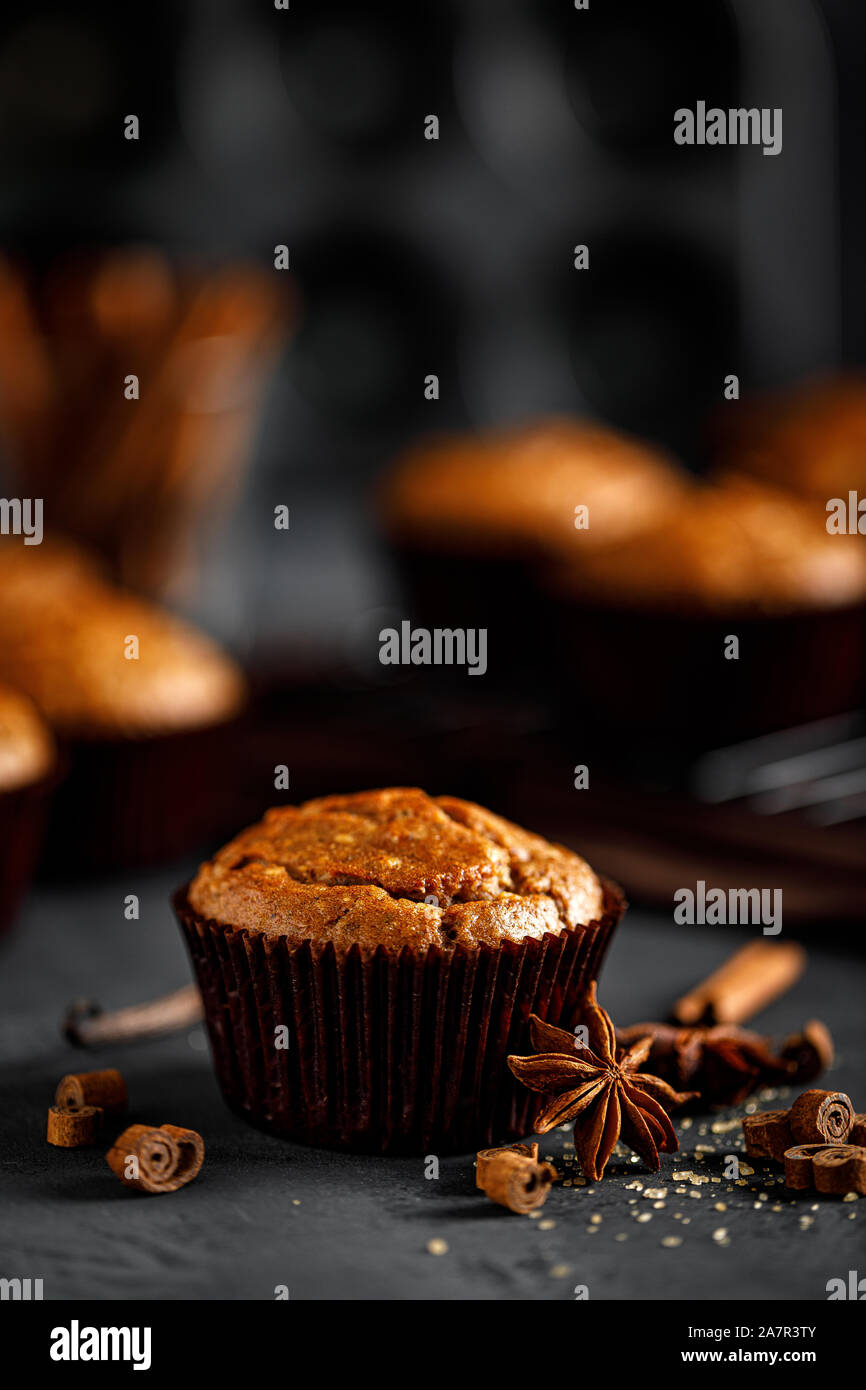 Cinnamon muffins on black background Stock Photo