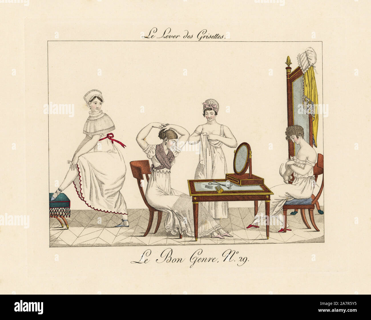 Shop girls dressing in the morning. Four shop girls dressing, fixing their hair in front of mirror, adjusting their stockings, playing with a cat. 'These little workers show such ingenious coquetry. They wear ordinary negliges, but have the art to add value to simple things.' Handcoloured engraving from Pierre de la Mesangere's Le Bon Genre, Paris, 1817. Stock Photo