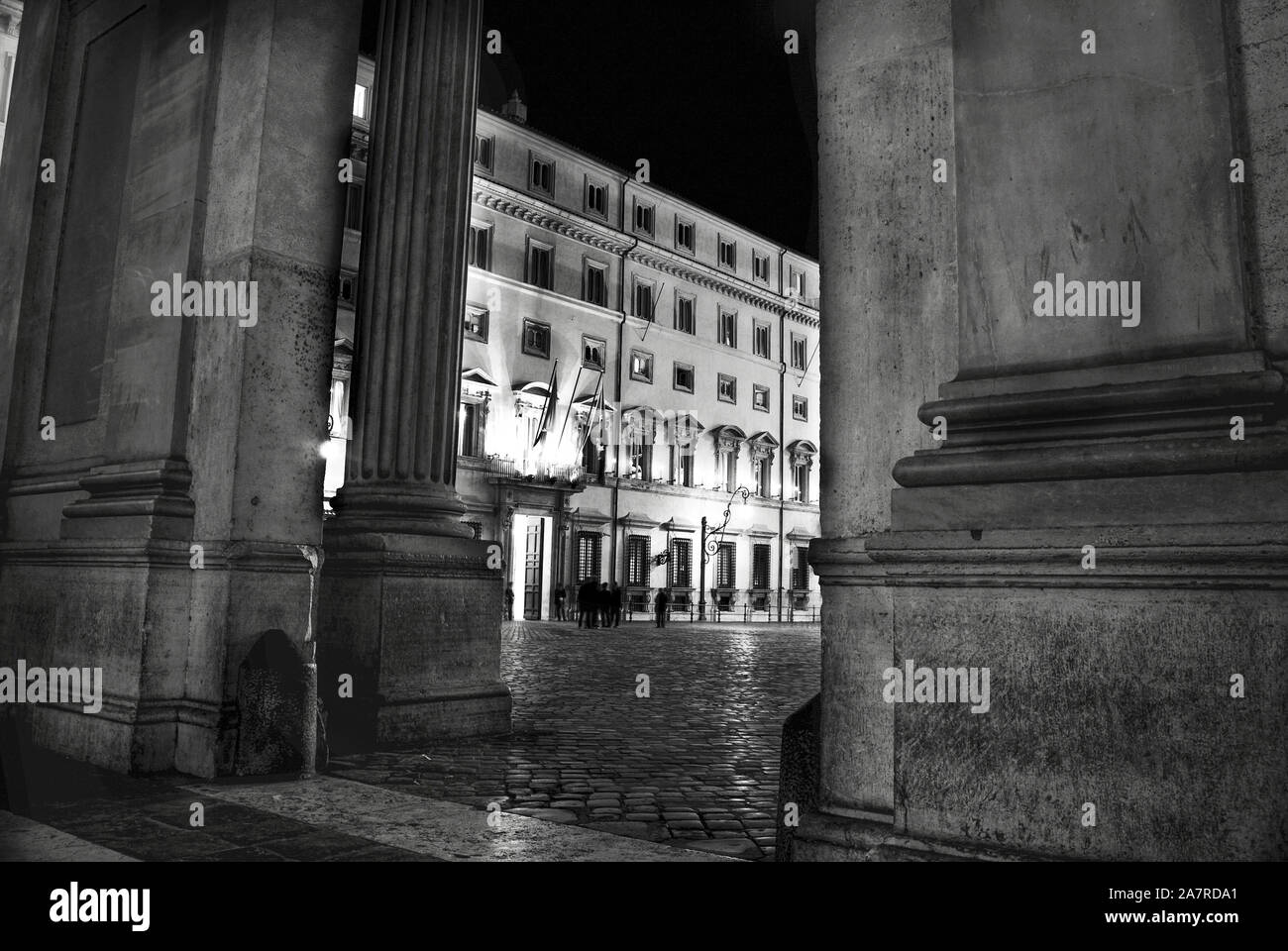 Rome. Chigi palace by night in black and white Stock Photo