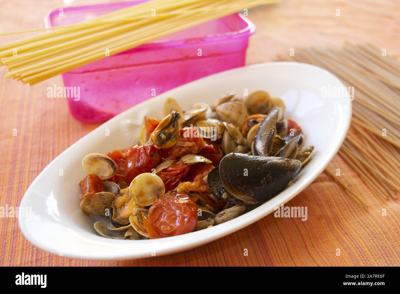 sautè of clams and mussels in a serving dish Stock Photo Alamy