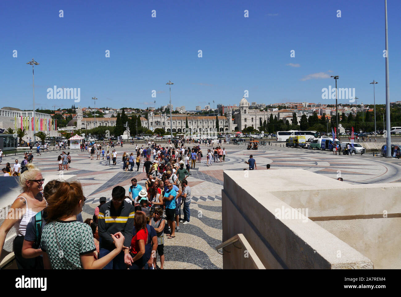 Portugal; Lisbon. District of Santa Maria de Belem. Tourists queueing to visit the Monument to the Discoveries (Monumento dos Descobrimentos). In the Stock Photo
