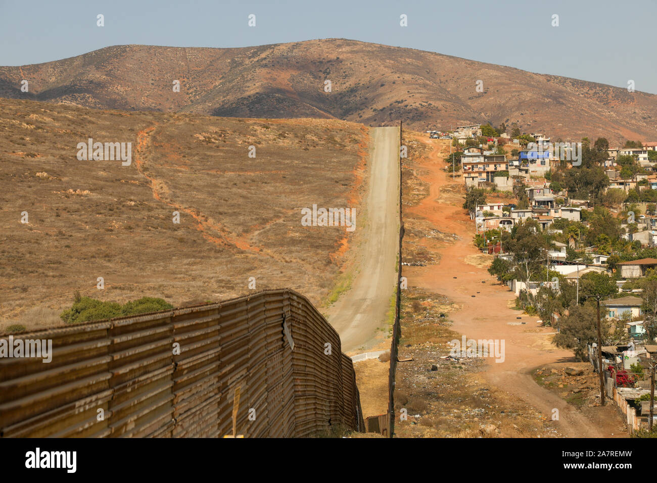 Original US Mexico border fence with prototypes of the proposed new Trump wall erected just