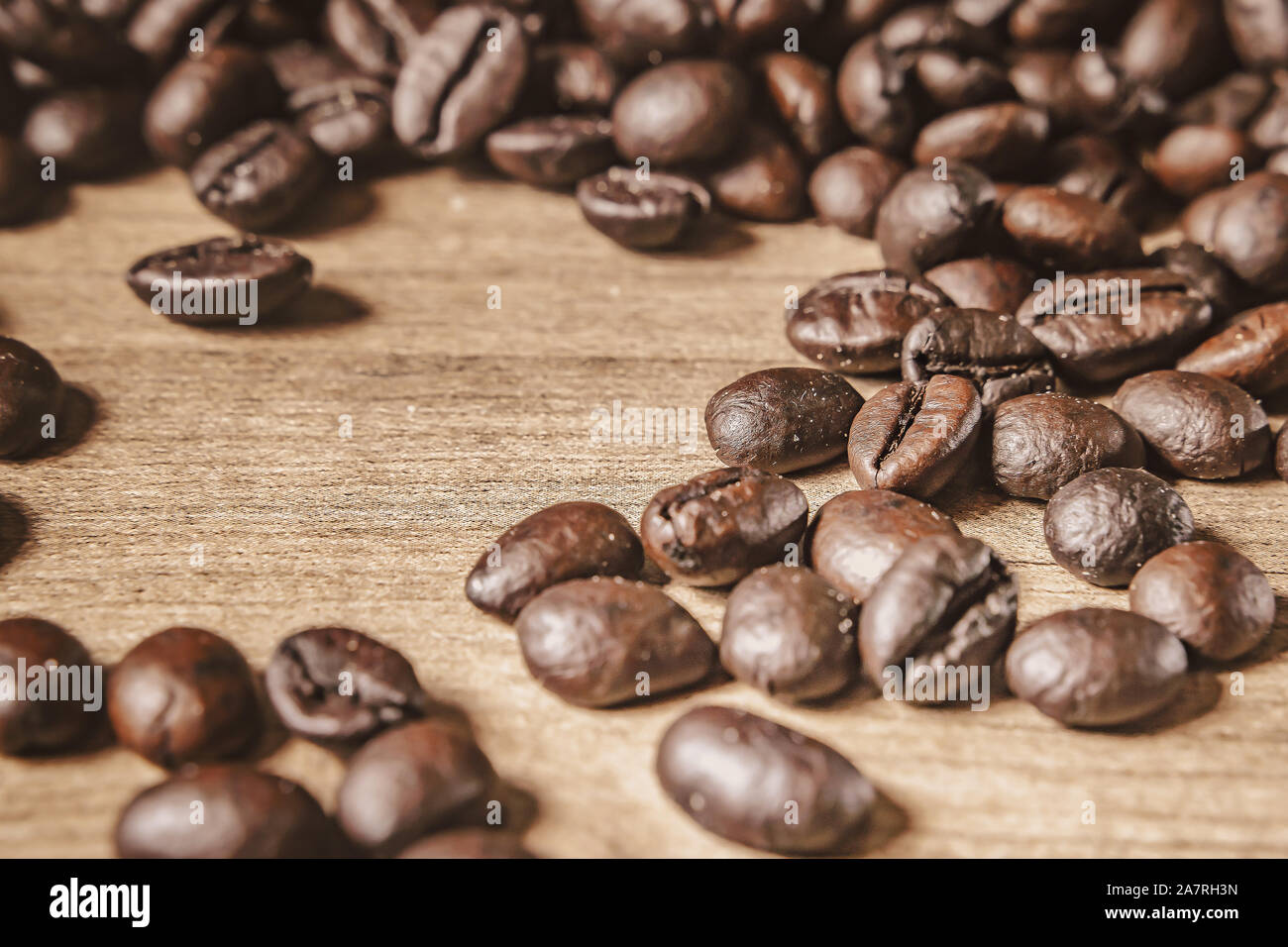Coffee on wooden background. Brown roasted coffee beans, seed on dark ...