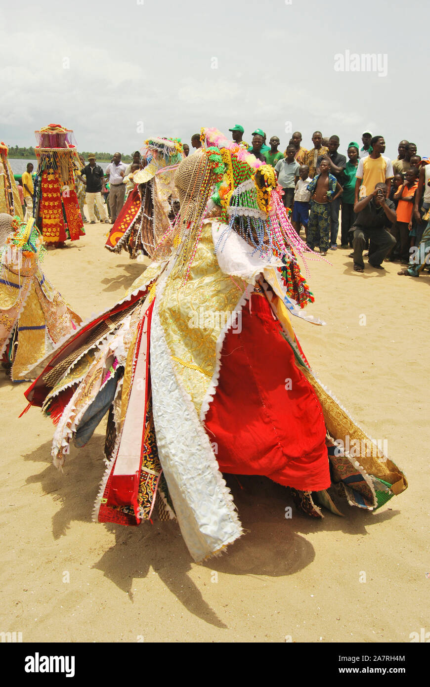 ORI-ADE Masks dancing at the Bank of Badagry Historical Slave Trade Beach during the Annual Lagos Black Heritage Festival. The Masquerades are popularly celebrated among Yoruba people of southwest Nigeria for ritual purposes and entertainment. Stock Photo