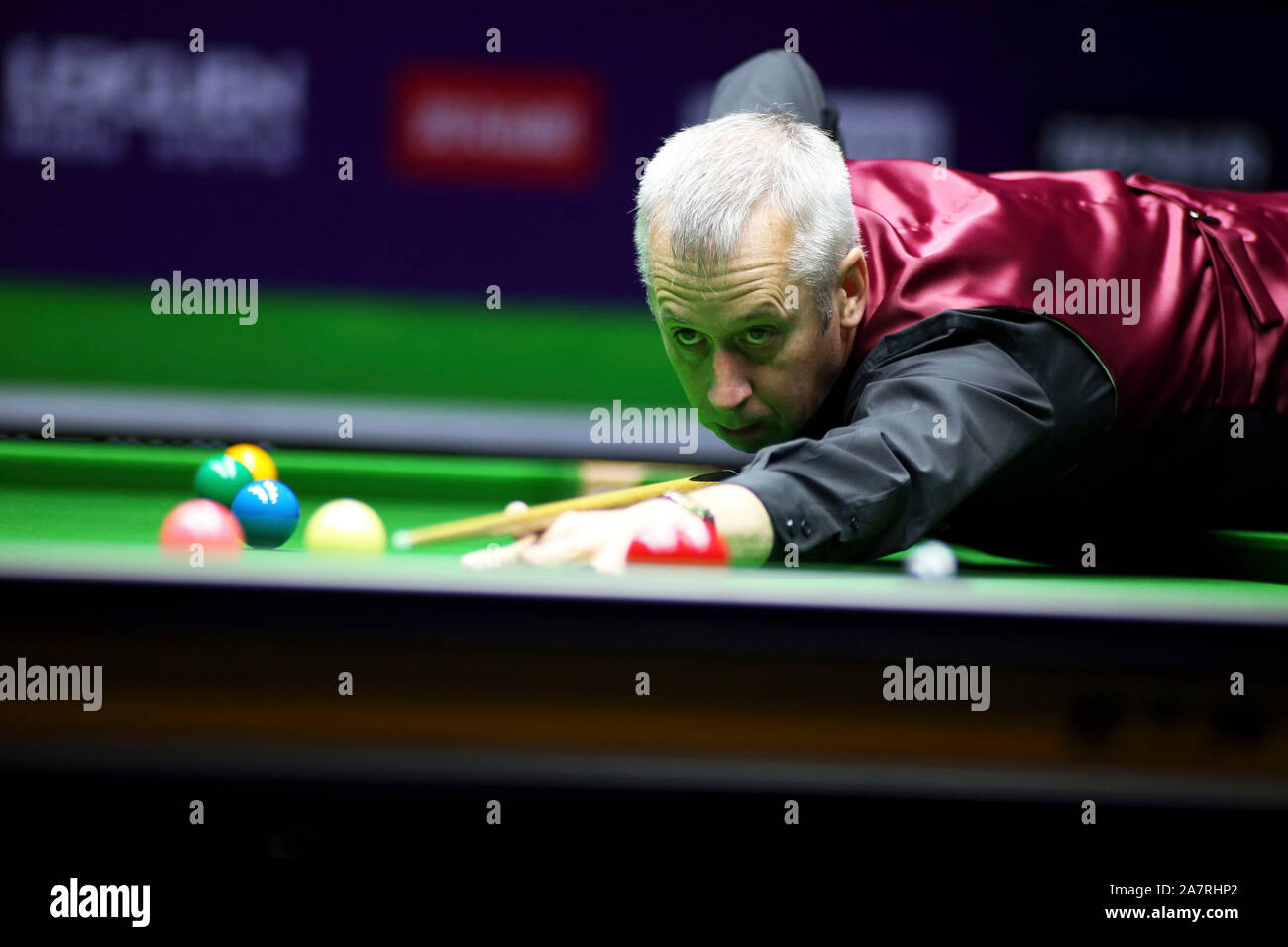 Nigel Bond Of England Plays A Shot To Neil Robertson Of Australia