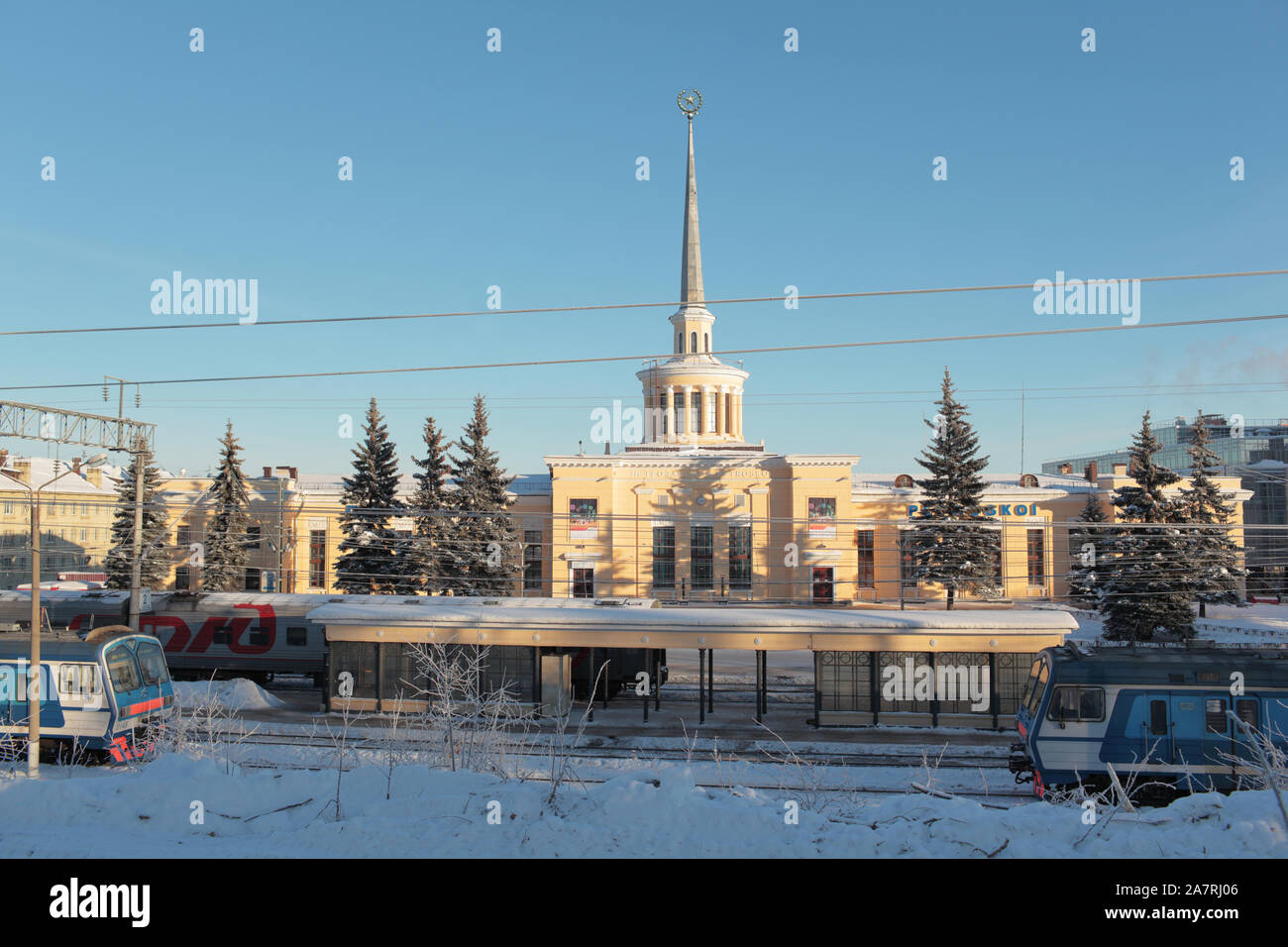 Petrozavodsk, Russia - January 18, 2013: Commuter trains on the railway station of Petrozavodsk, Karelia, Russia on January 18, 2013. The building was Stock Photo