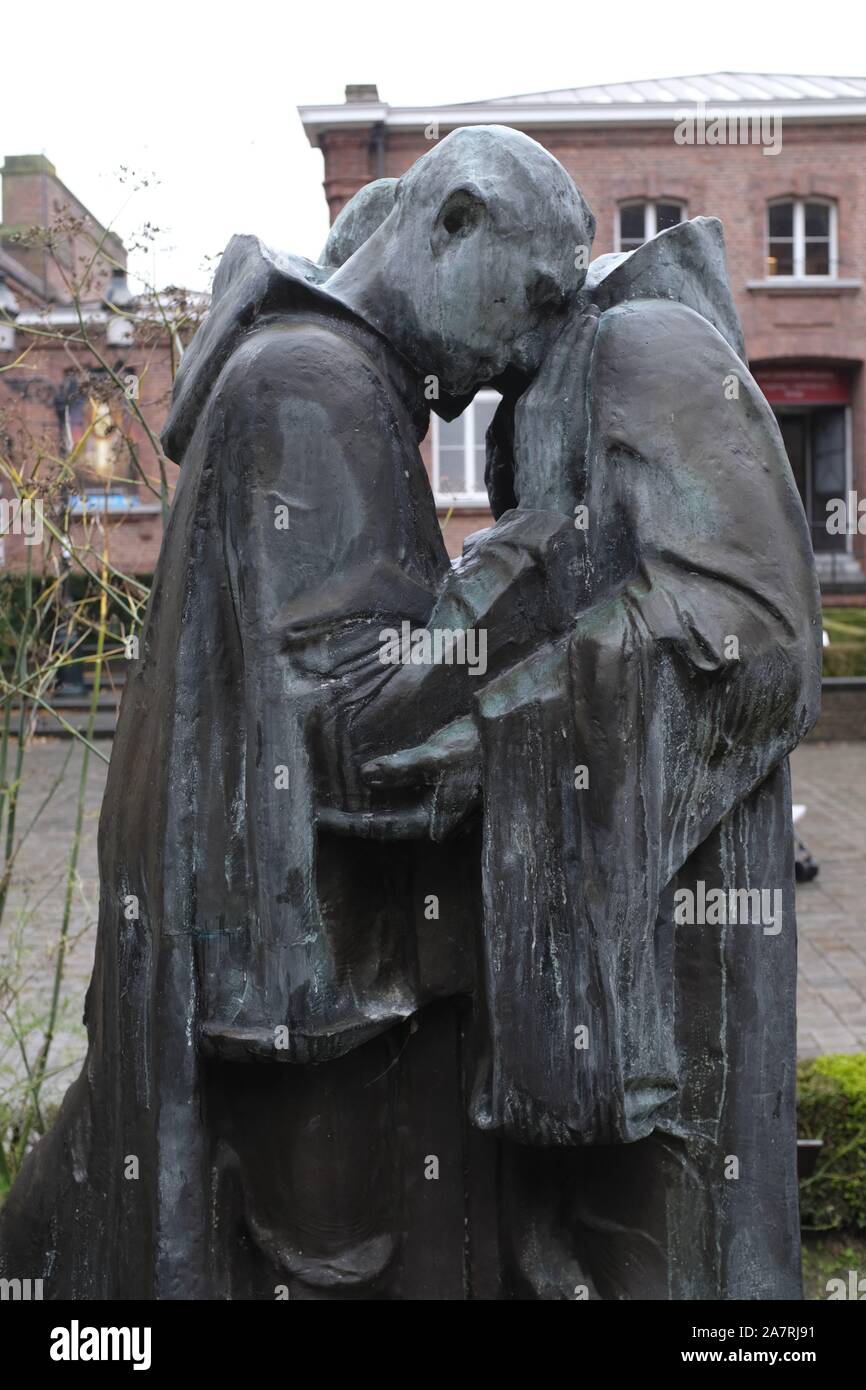statue sculptured by Octave Rotsaert in the courtyard of St Johns Hospital in Bruges, Belgium Stock Photo