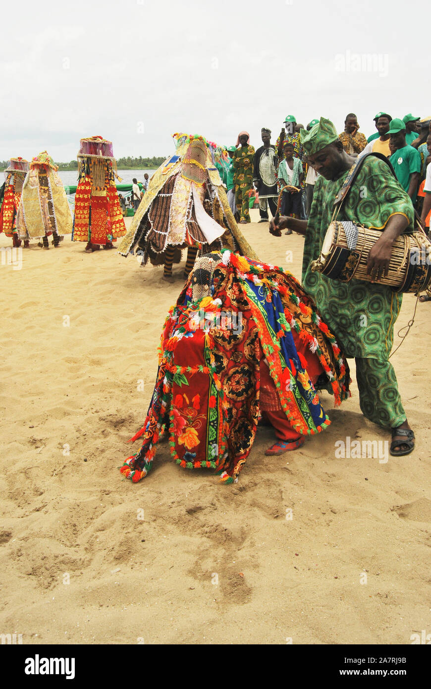 ORI-ADE Masks dancing at the Bank of Badagry Historical Slave Trade Beach during the Annual Lagos Black Heritage Festival. Stock Photo