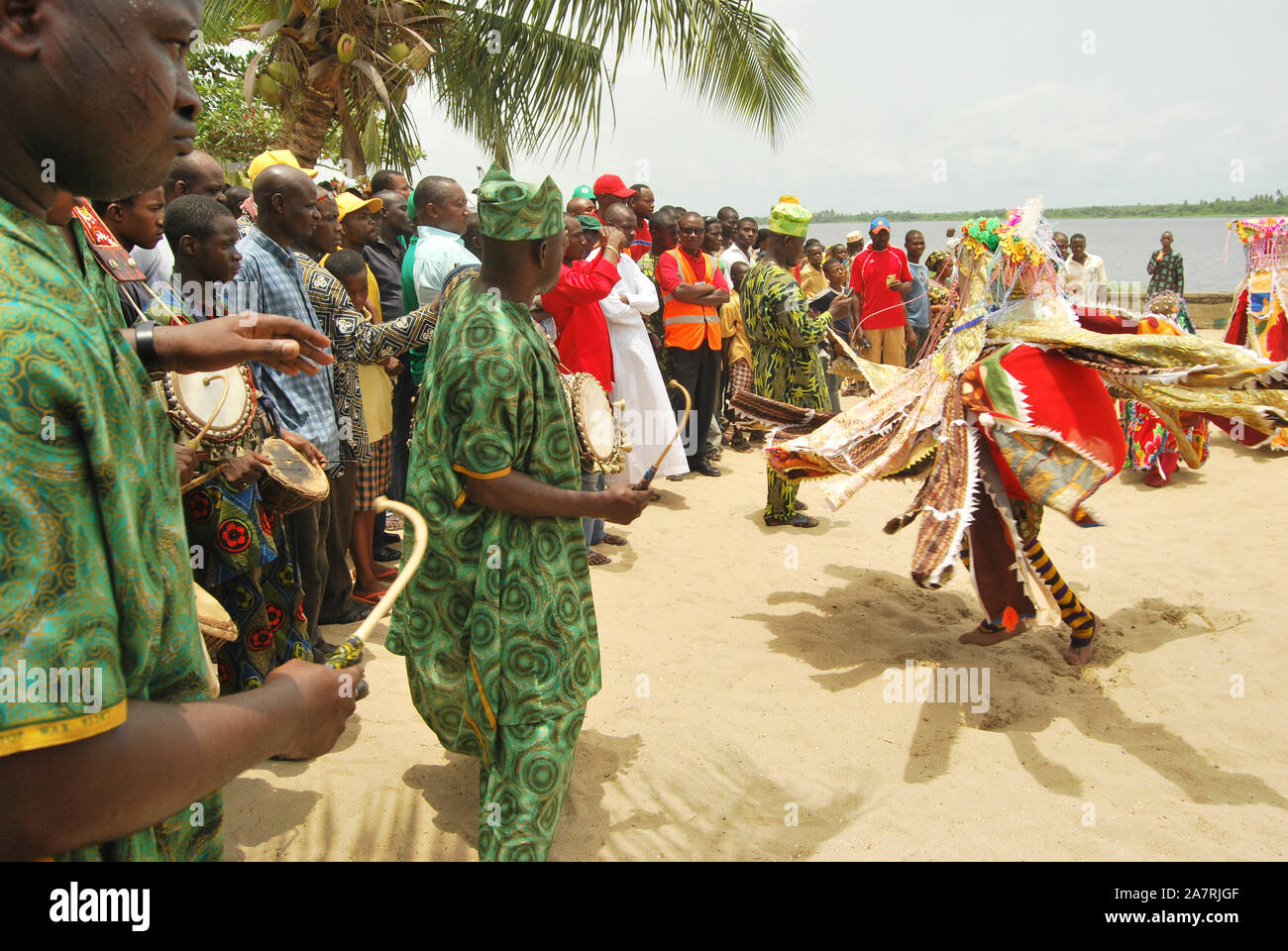 ORI-ADE Masks dancing at the Bank of Badagry Historical Slave Trade Beach during the Annual Lagos Black Heritage Festival. The Masquerades are popularly celebrated among Yoruba people of southwest Nigeria for ritual purposes and entertainment. Stock Photo