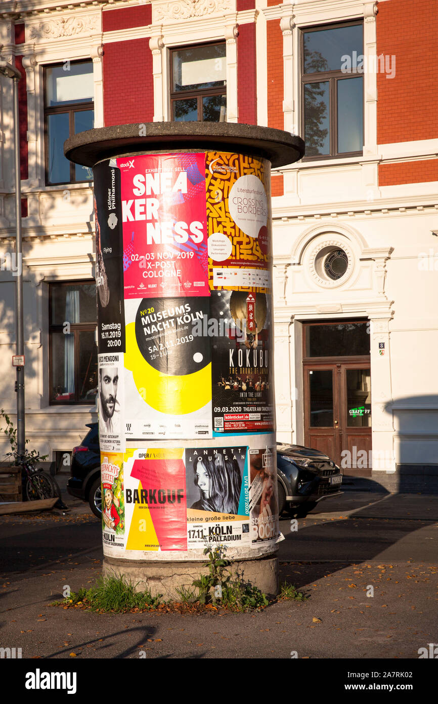 advertising pillar with event notes on Hansaplatz square, Cologne, Germany.  Litfasssaeule mit Veranstaltungshinweisen am Hansaplatz, Koeln, Deutschla Stock Photo