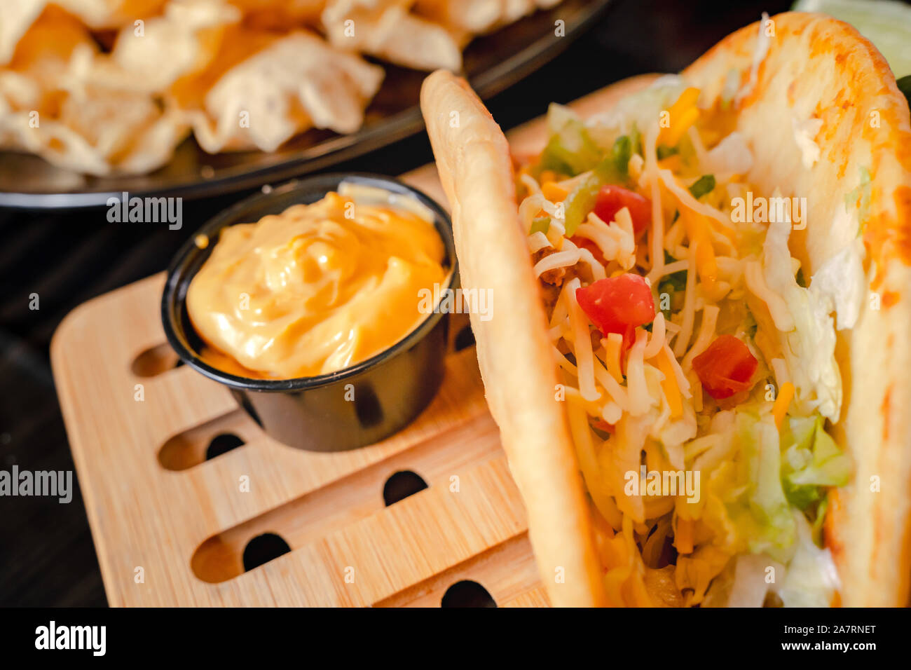 Homemade Baja Fish Tacos with Mango Salsa and Chips. Mixed mexican food ...