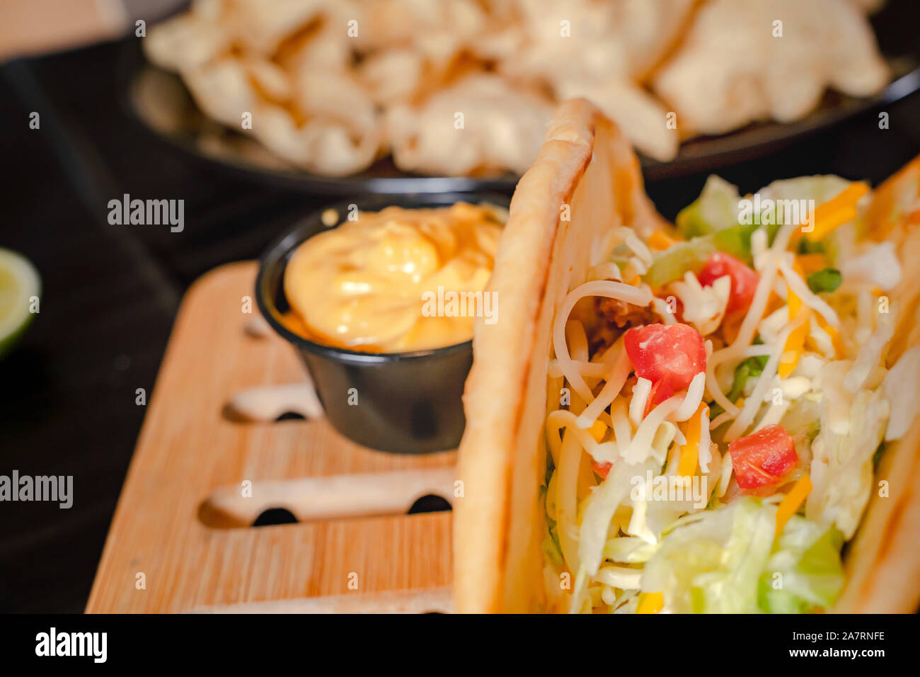 Homemade Baja Fish Tacos with Mango Salsa and Chips. Mixed mexican food ...