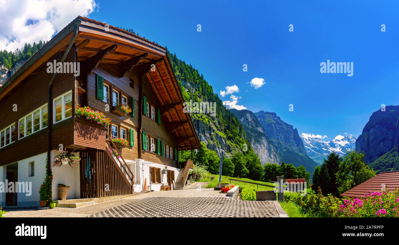 Wonderful mountain village of Lauterbrunnen and the Lauterbrunnen Wall in Swiss Alps, Switzerland. Stock Photo