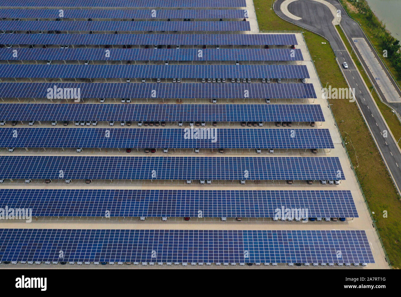 An aerial view of the large carport which is equipped with solar power system designed to provide 4300 kWh daily and over 8 million kWh annually in a Stock Photo