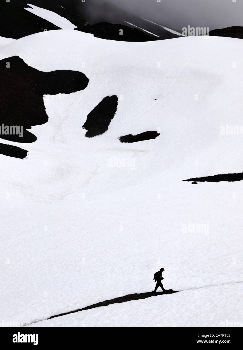 Mann im Schnee Stock Photo