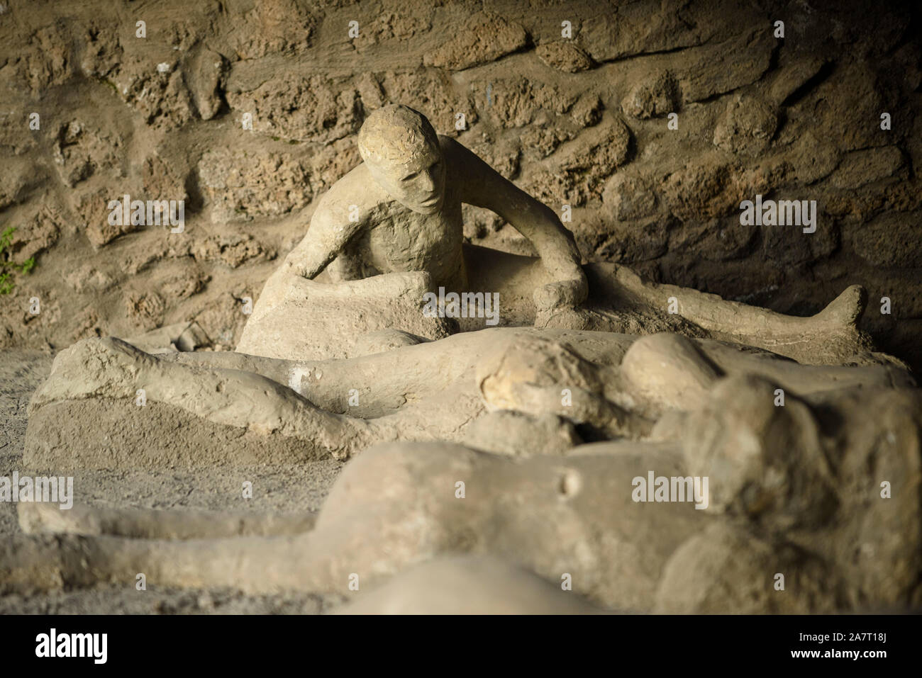 Pompei. Italy. Archaeological site of Pompeii. Orto dei Fuggiaschi / Garden of the Fugitives, plaster casts of bodies of people who died as they tried Stock Photo