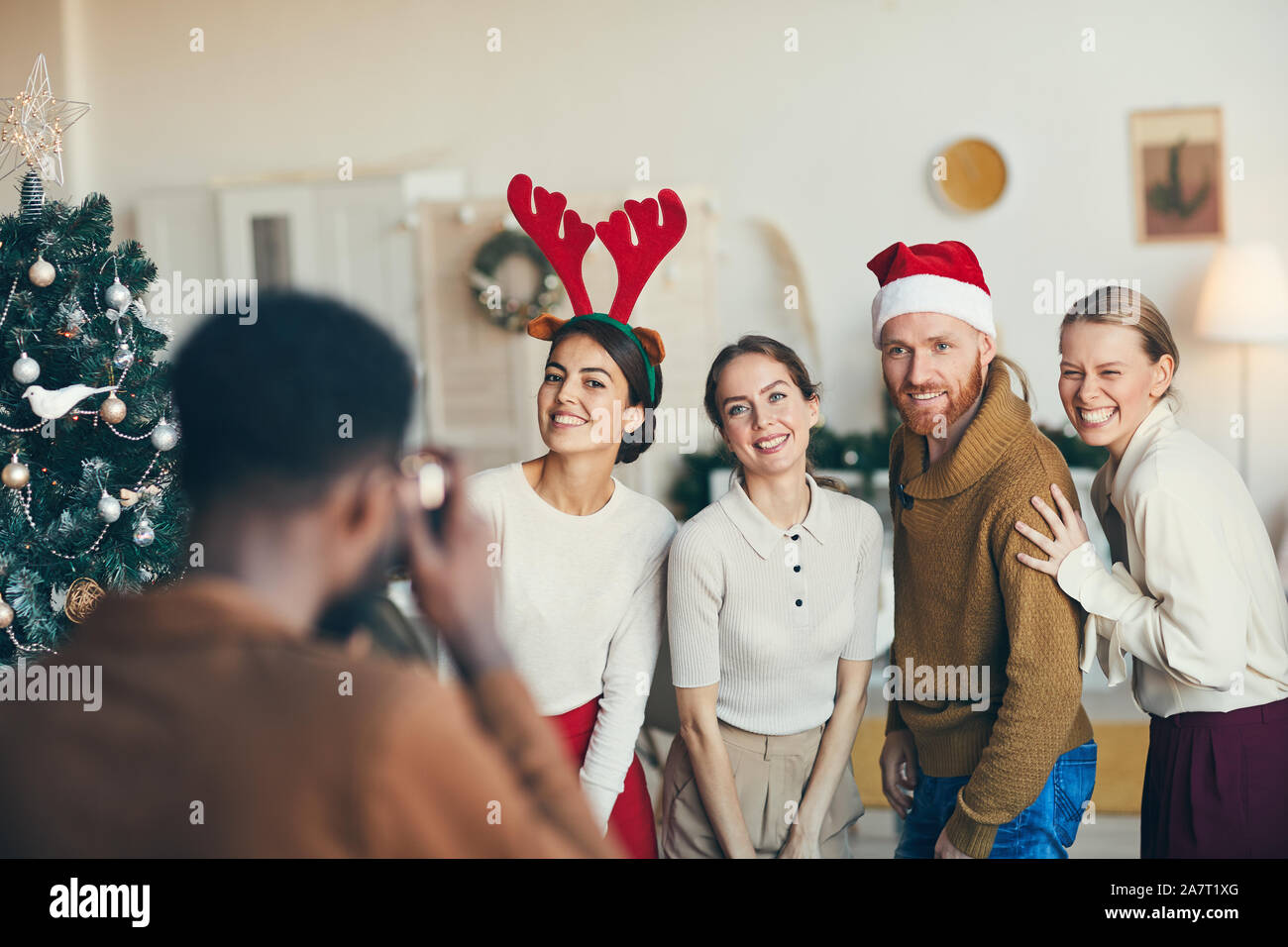 Young women wearing party hats hi-res stock photography and images - Alamy