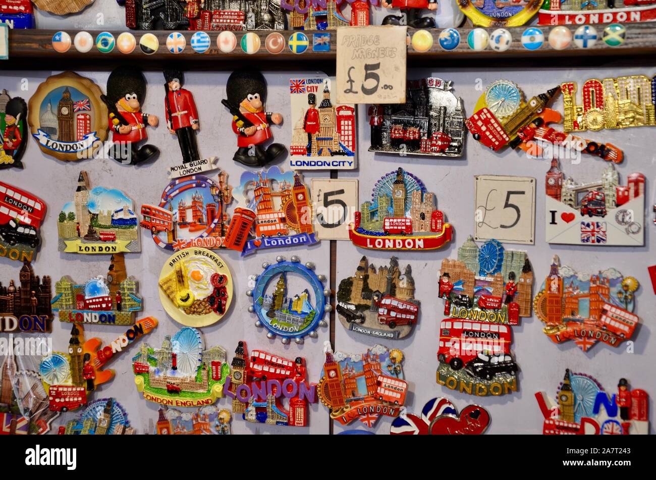 Malaga, Spain- April 03, 2018: Ceramic souvenirs for sale in Malaga, Spain.  Colorful Fridge souvenir magnets Stock Photo - Alamy
