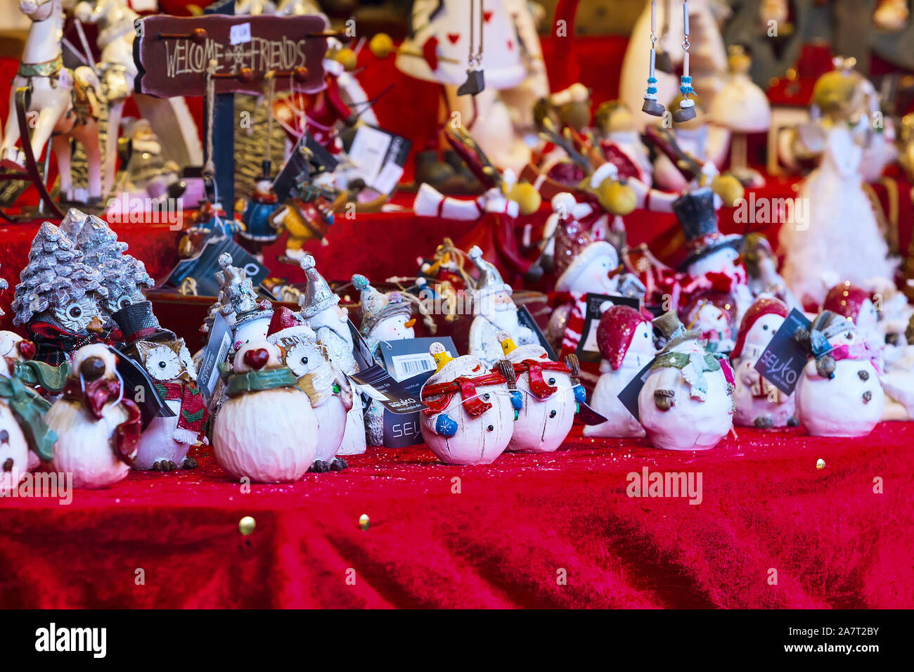 Artisan hand-painting a Christmas ornament