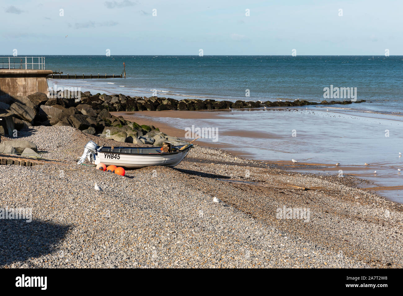 Sheringham Beach with Boat Stock Photo - Alamy
