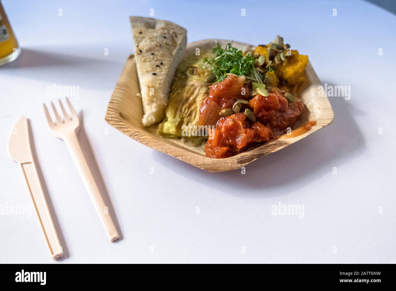 Vegetarian food lies in a disposable plate Stock Photo