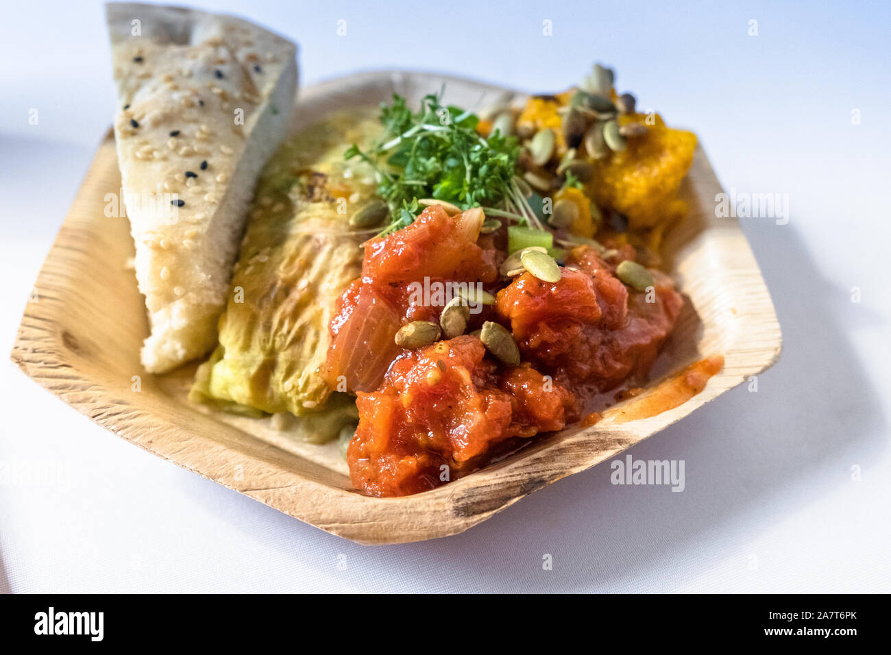 Vegetarian food lies in a disposable plate Stock Photo
