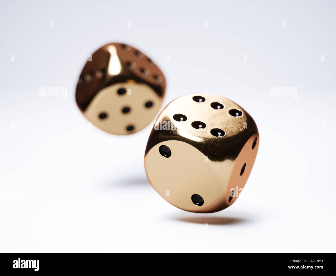 3d render of golden dices isolated on white background Stock Photo
