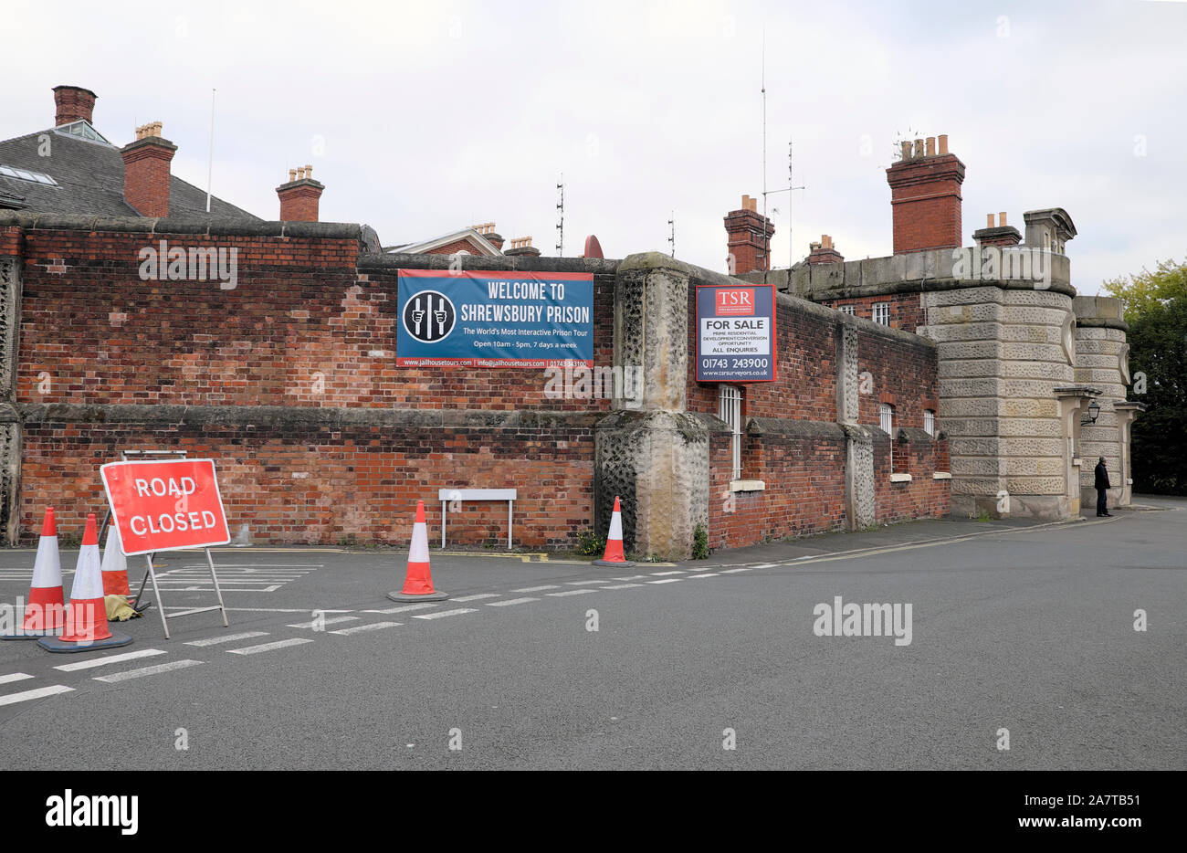 Property for sale sign on the outsde wall of Shrewsbury prison building exterior  England UK    KATHY DEWITT Stock Photo