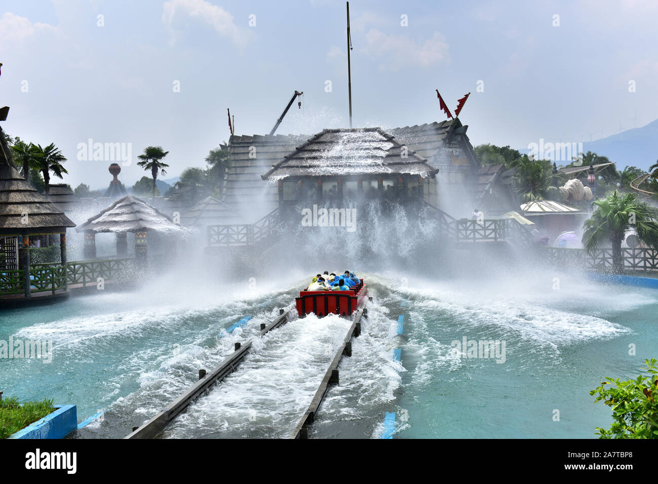 A rollar coaster with passengers is ''surfing'' in Guilin Merryland Theme Part in Guilin city, south China's Guangxi Zhuang Autonomous Region, 25 Augu Stock Photo