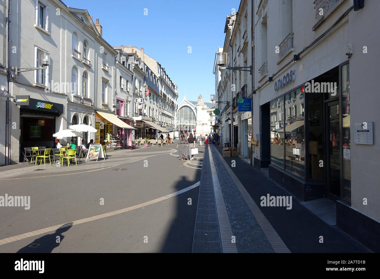 Tours, France 31 July 2019: Shops and people along the pedestrianised Rue de Bordeaux in Tours, France Stock Photo