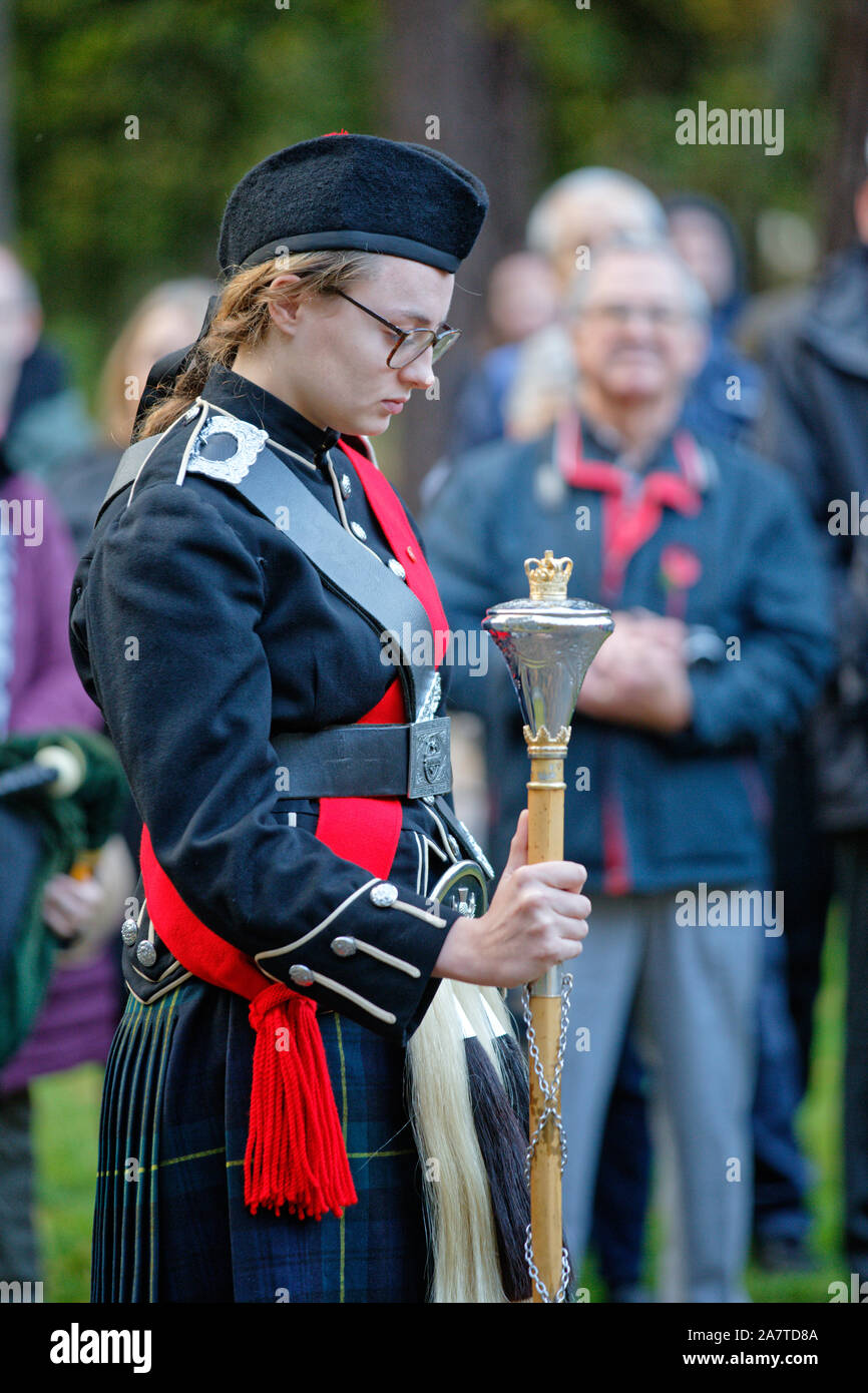 Sun 3rd Nov 2019. Surrey, UK. The Drum Major with bowed head during the remembrance service for the fallen. Stock Photo