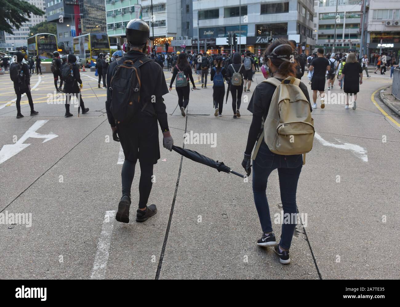 November 2, 2019, Hong Kong, China: Protesters hold an umbrella during the demonstration..The pro-democracy movement was originated with the outcry against the extradition bill. Hong Kong has entered 22nd week continued mass protests. (Credit Image: © Miguel Candela/SOPA Images via ZUMA Wire) Stock Photo
