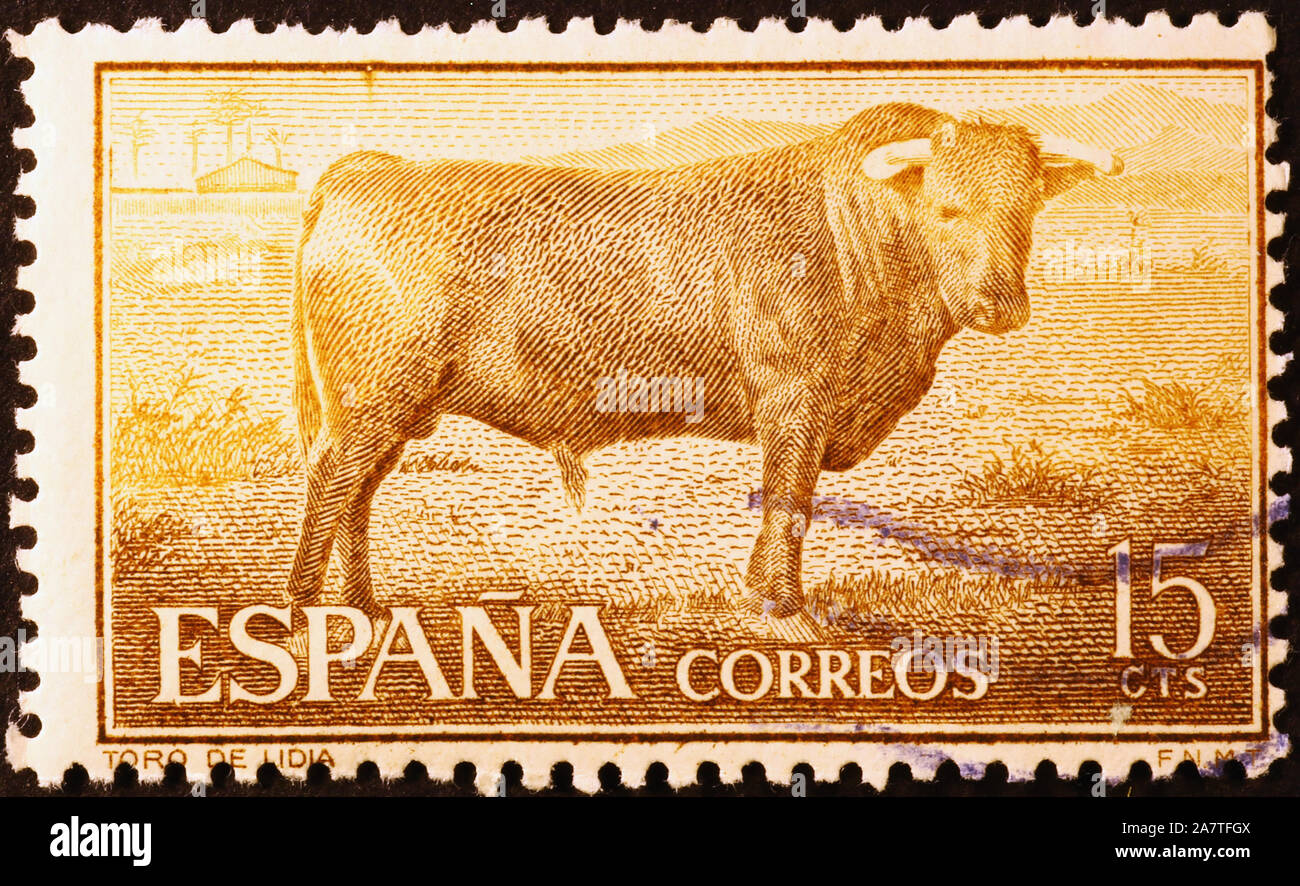 Old spanish stamp with a bull Stock Photo