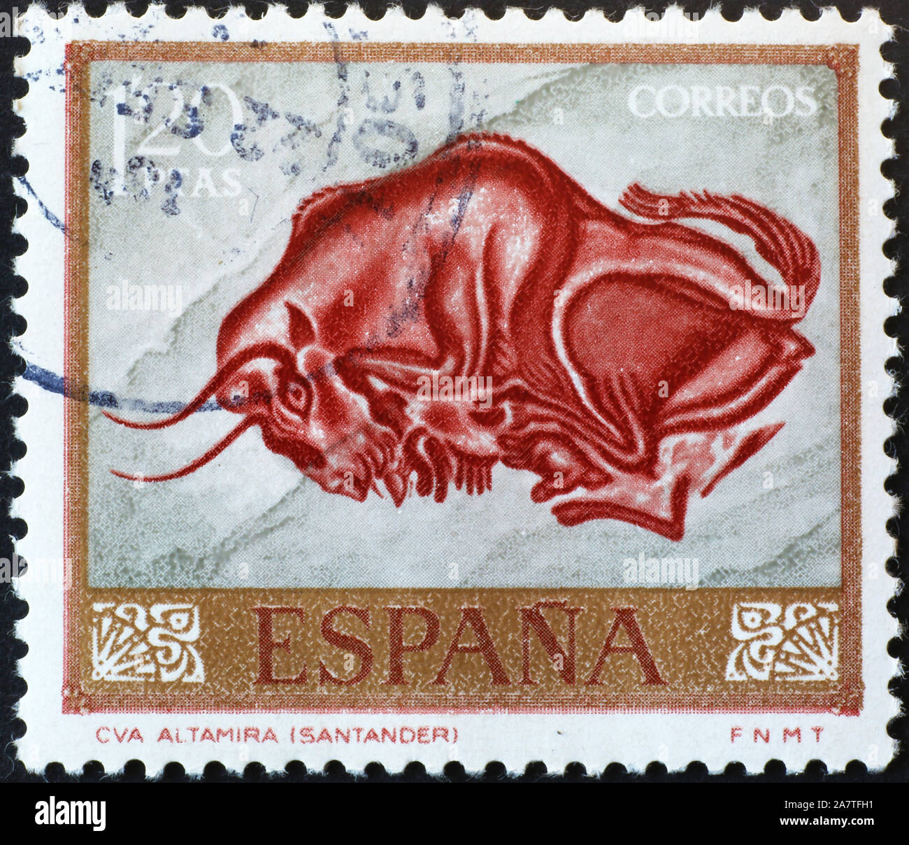 Prehistoric depiction of aurochs on spanish postage stamp Stock Photo
