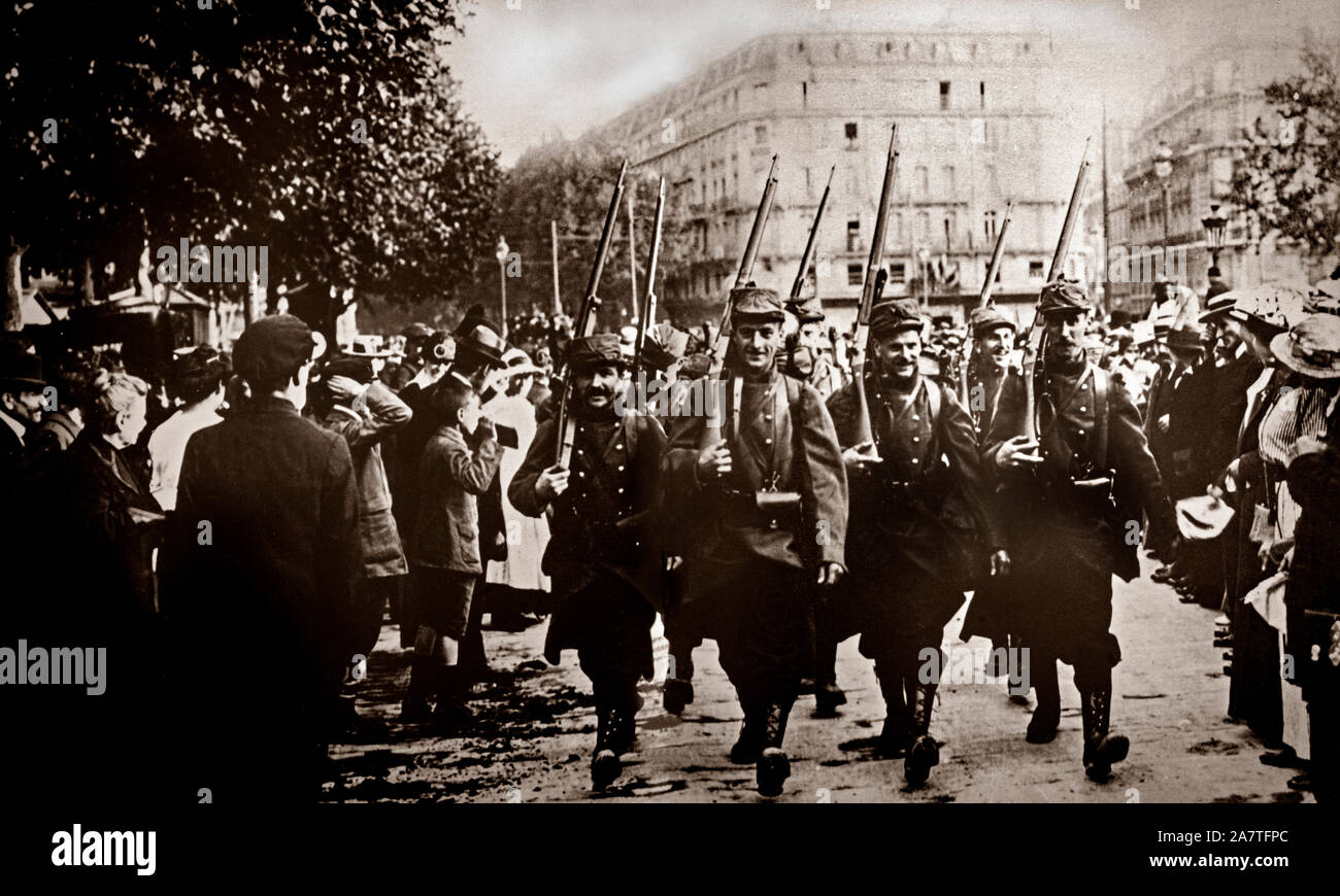 French 'Poilus' or Infantrymen marching to the front prior to the outbreak of war in August 1914.  Poilu is still widely used as a term of endearment for the French infantry of World War I. The word carries the sense of the infantryman's typically rustic, agricultural background. Stock Photo