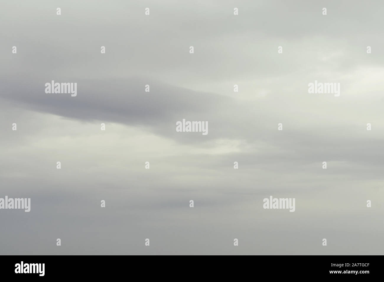 Soft background with stratus clouds. Dramatic cloudscape under cinematic color filter Stock