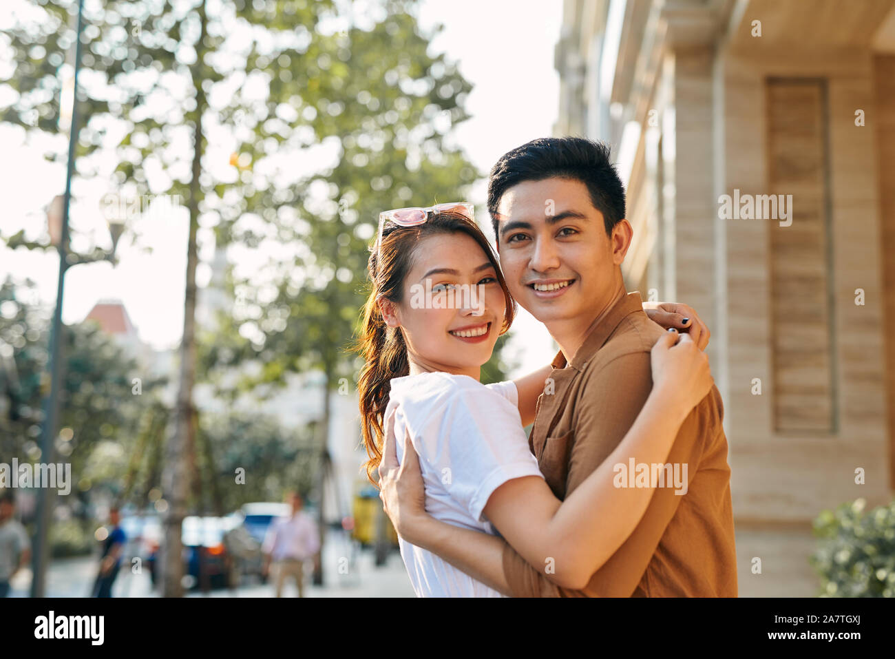 Attractive young couple hugging in hi-res stock photography and images ...