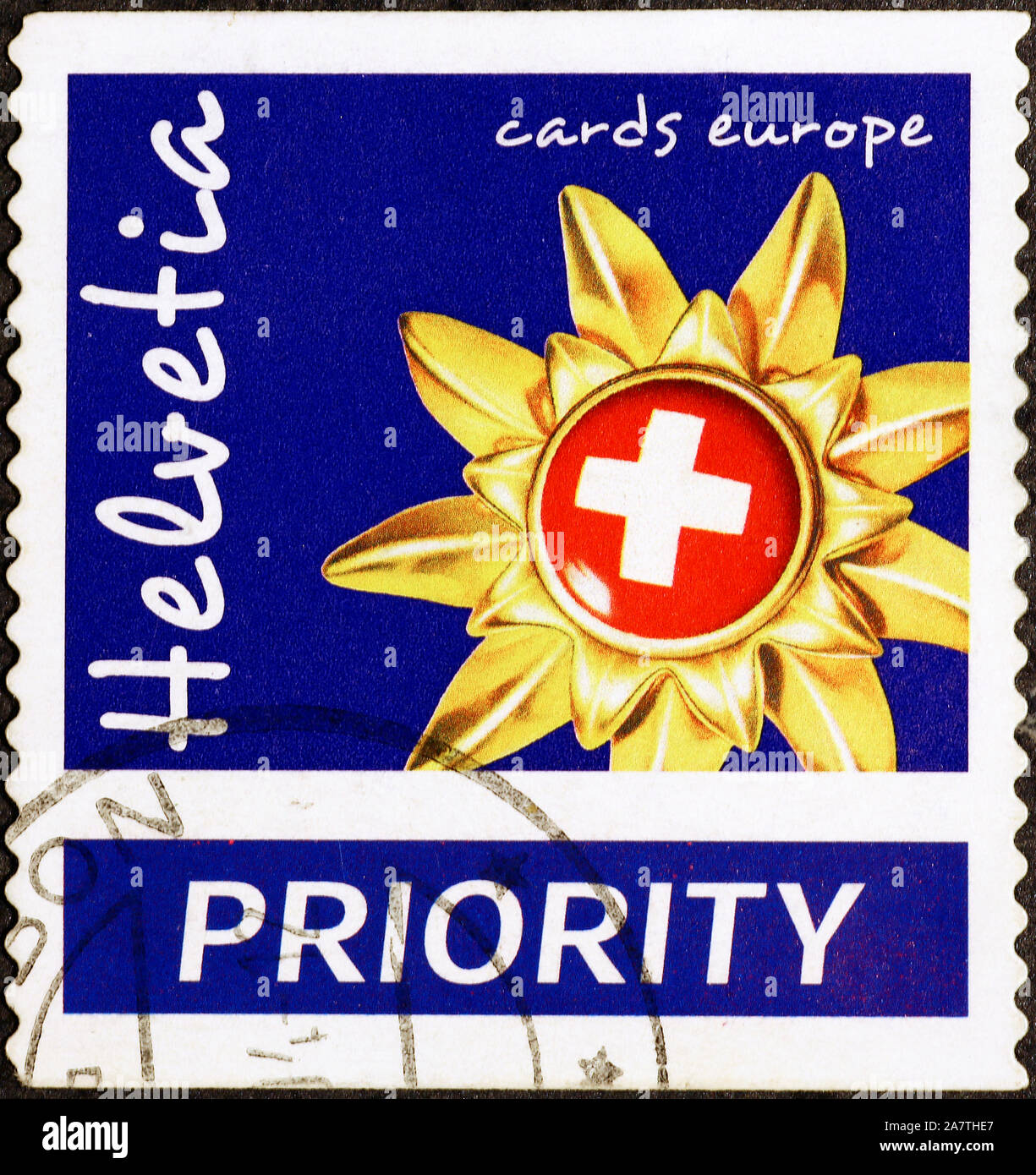 Priority swiss postage stamp Stock Photo