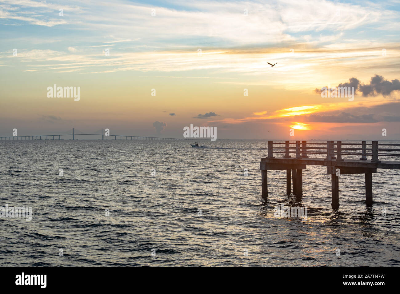 Sunrise view of a bridge and pier in Central Florida Stock Photo