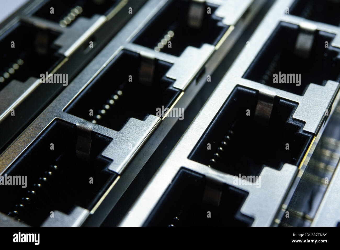 Isolated close up of closely aligned multiple through hole assembly