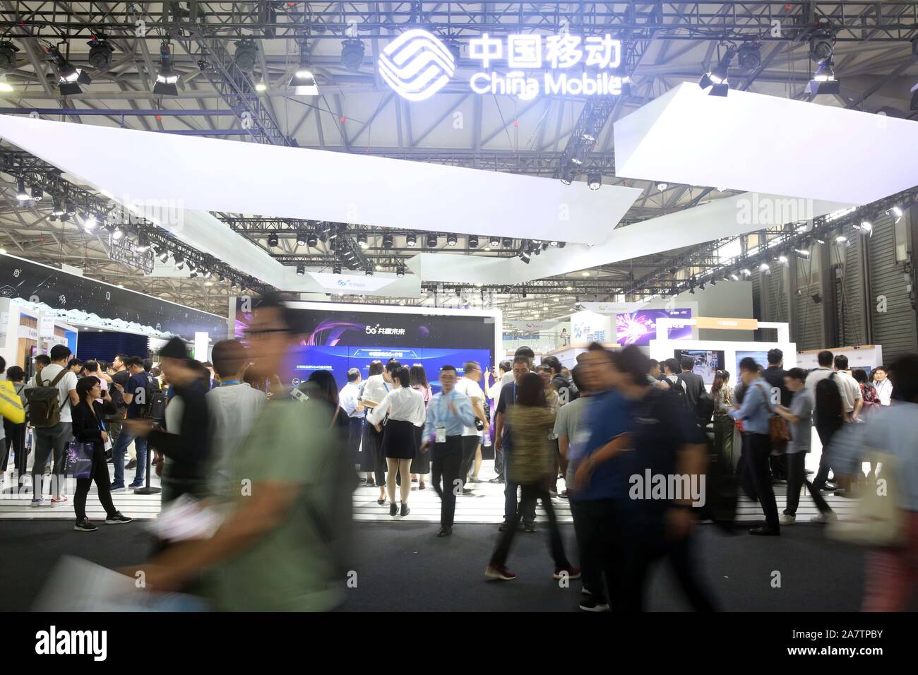 --FILE--People visit the stand of China Mobile during the 2019 Mobile World Congress (MWC) in Shanghai, China, 27 June 2019.   China Mobile, China's l Stock Photo