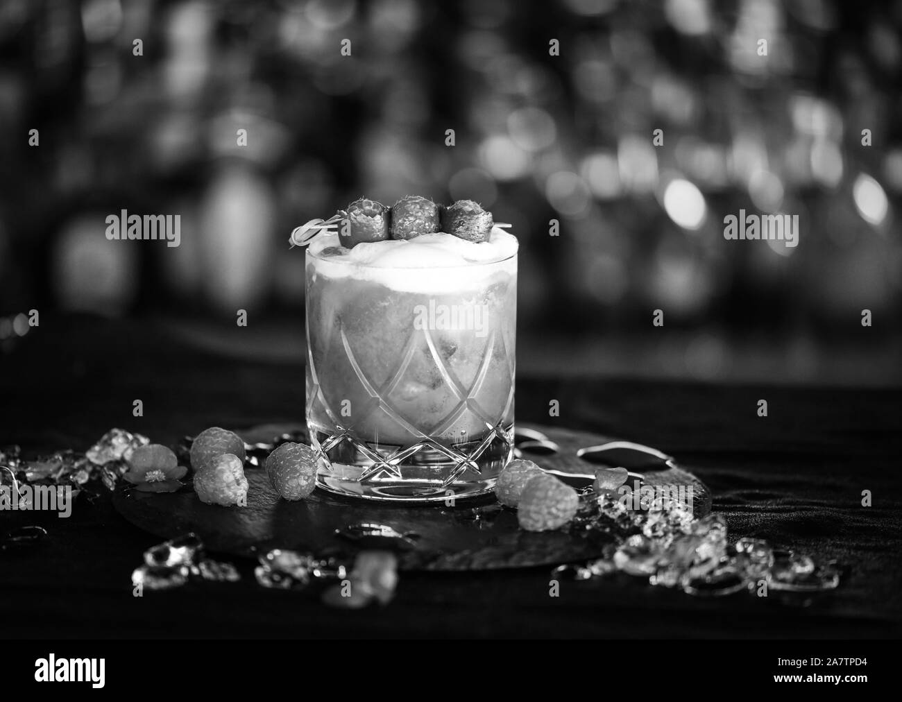 raspberry & lime cocktail with fresh egg foam Stock Photo Alamy