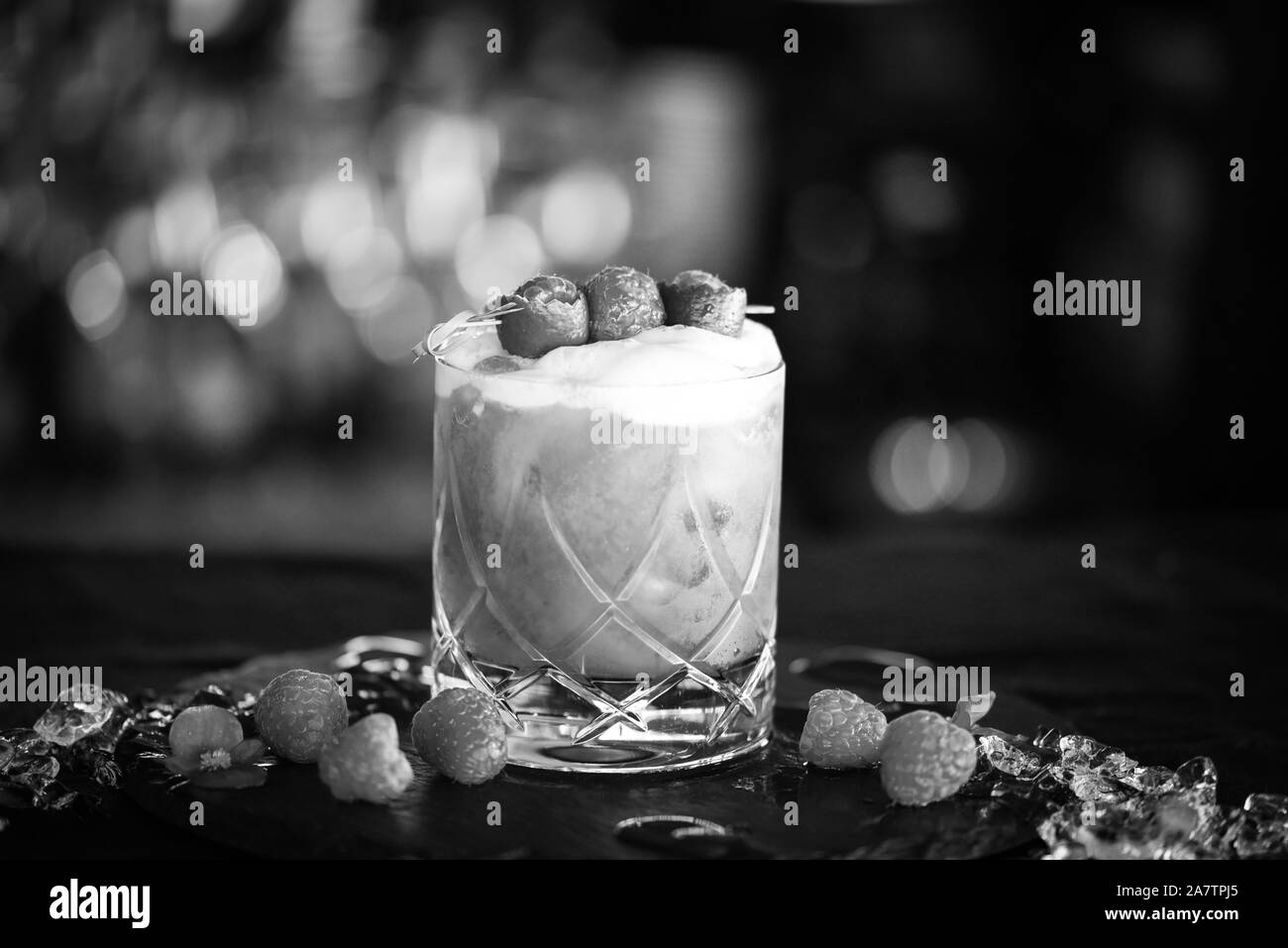 raspberry & lime cocktail with fresh egg foam Stock Photo Alamy