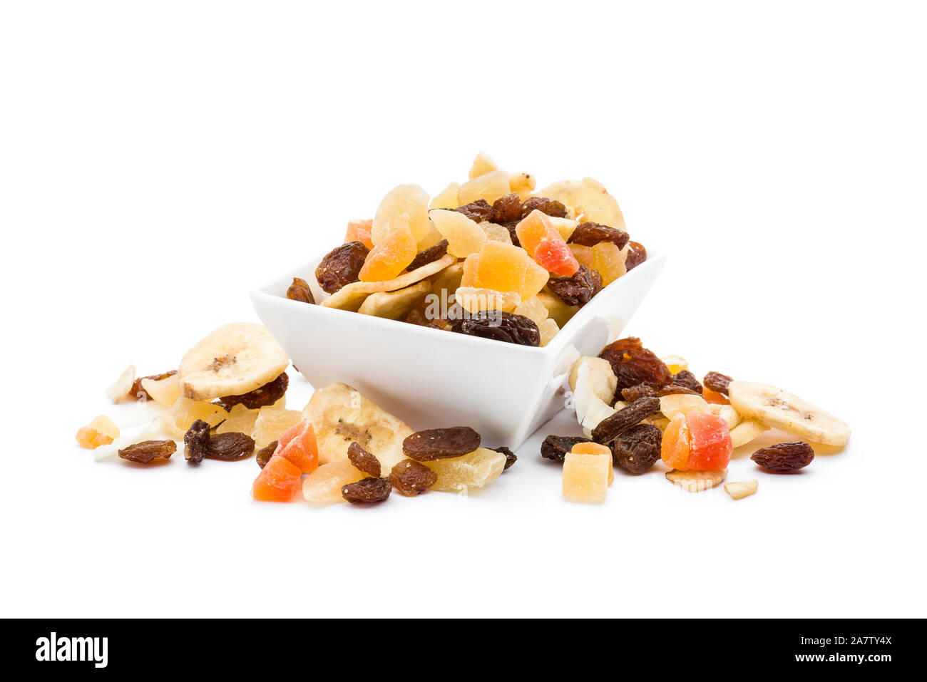 Dried fruits in white bowl on white background Stock Photo
