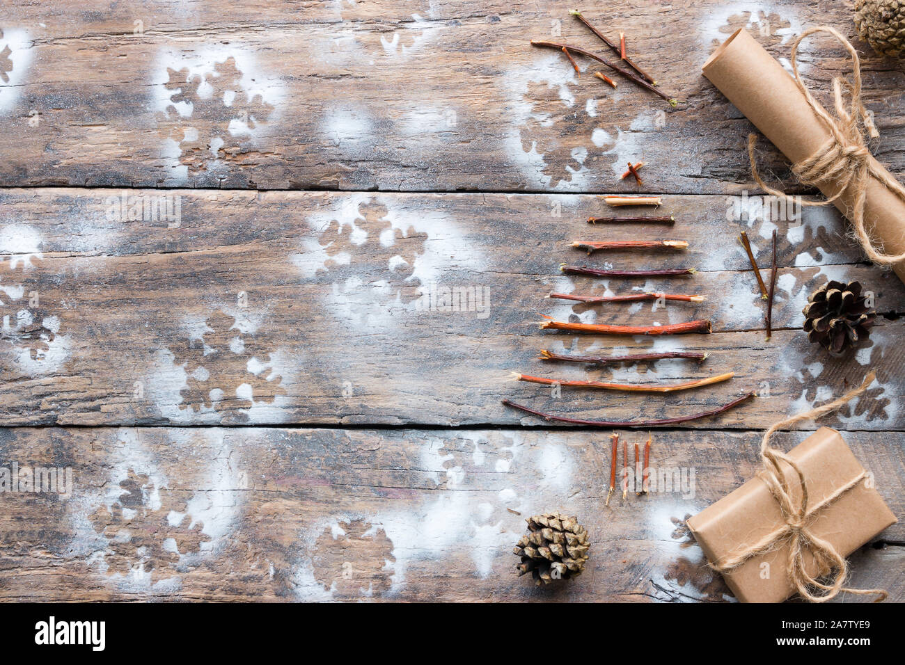 Christmas Tree Made Of Twigs Gifts And Cones On The Wooden