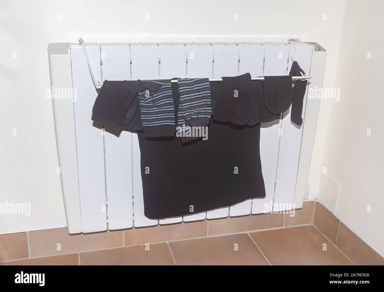 Clothes drying on the radiator in an house Stock Photo Alamy