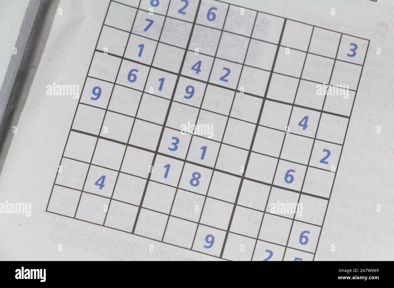 Sudoku game in a newspaper to train your brain Stock Photo