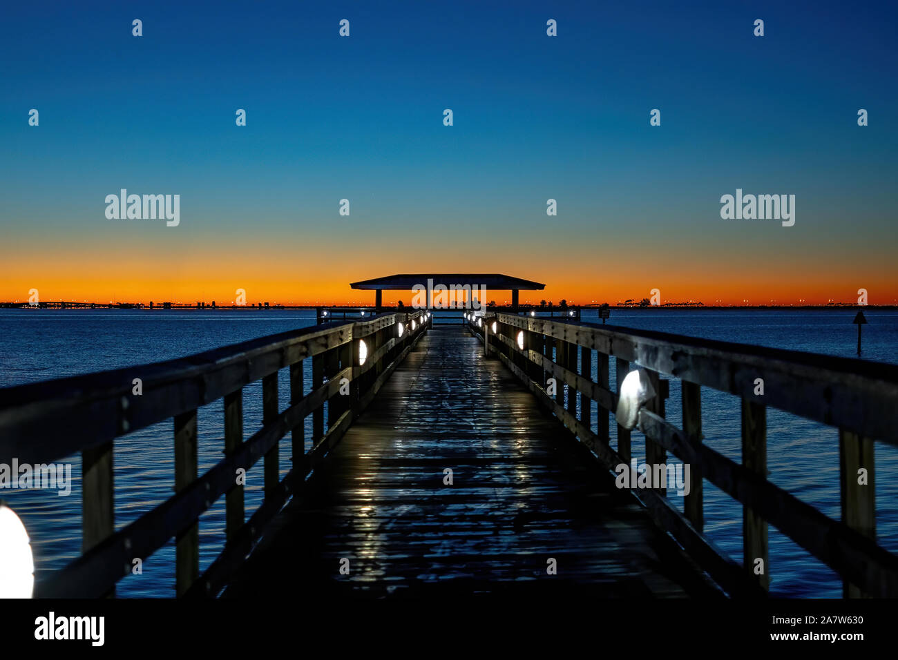 Dawn at the pier in Central Florida Stock Photo