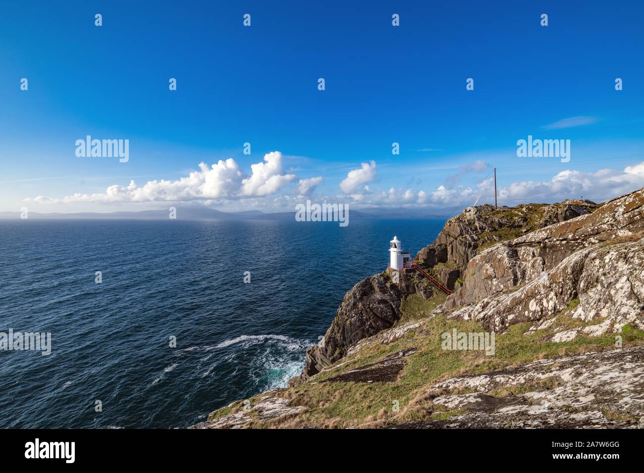 Sheep's Head Lighthouse at the end of Sheep's Head Peninsula in the southwest of Ireland. Stock Photo